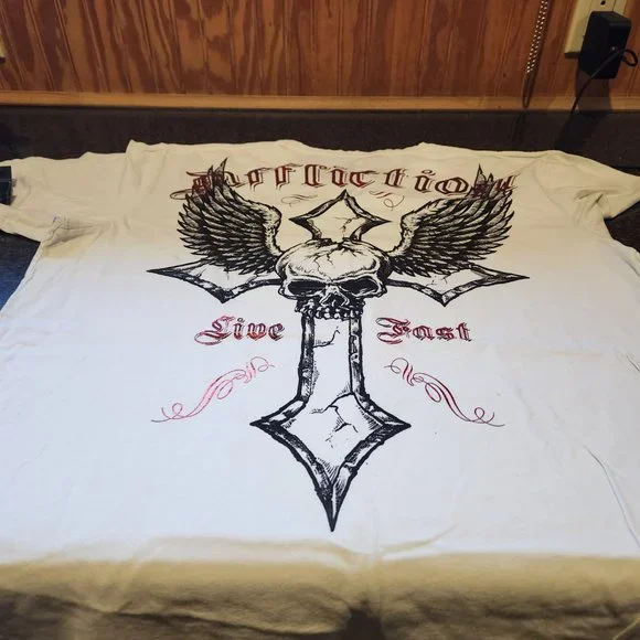 Brand new affliction shirt with fighters signatures